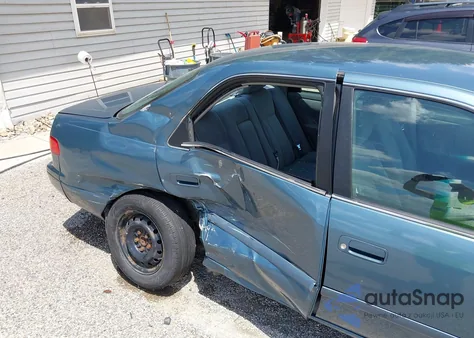 2001 Toyota Camry Le from USA, damaged, VIN 4T1BG22KX1U869581